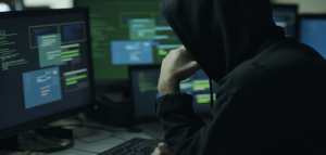 Cybercriminal monitoring multiple screens during a phishing campaign abusing npm infrastructure