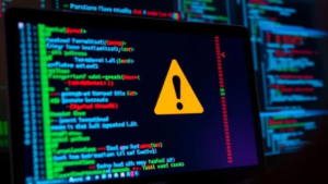 Warning symbol on computer screen showing vulnerable code during Microsoft security update